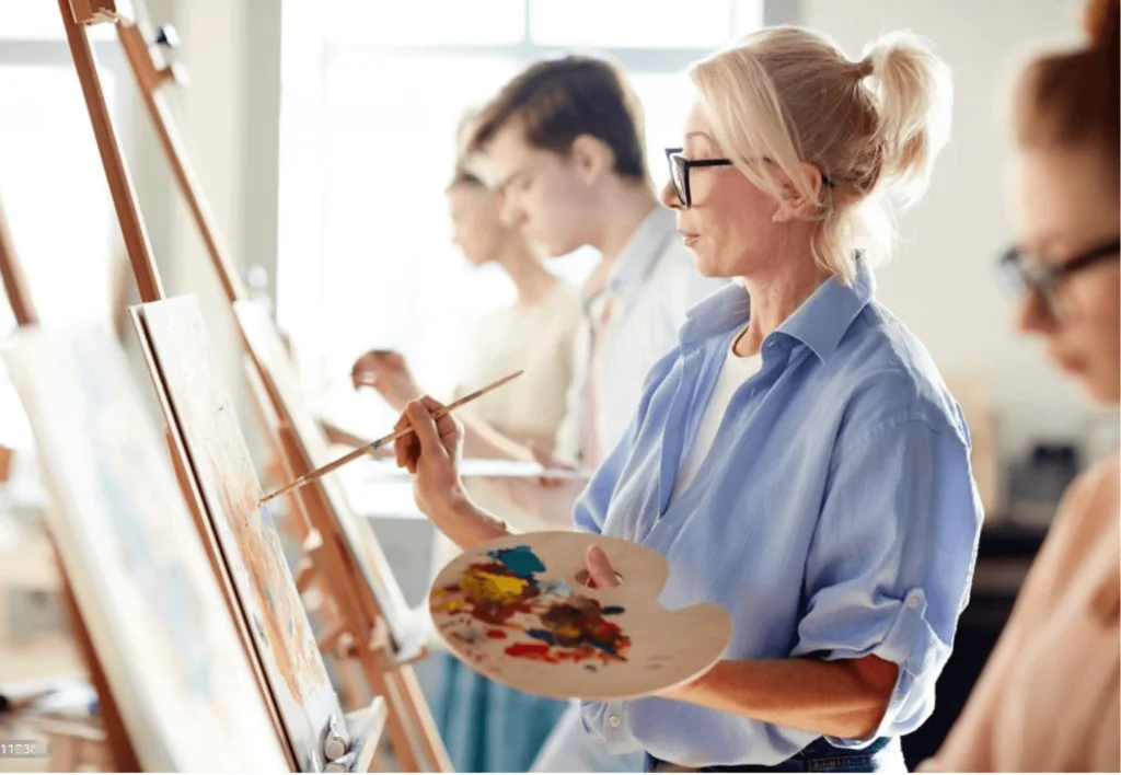 woman painting at isandboxfactory